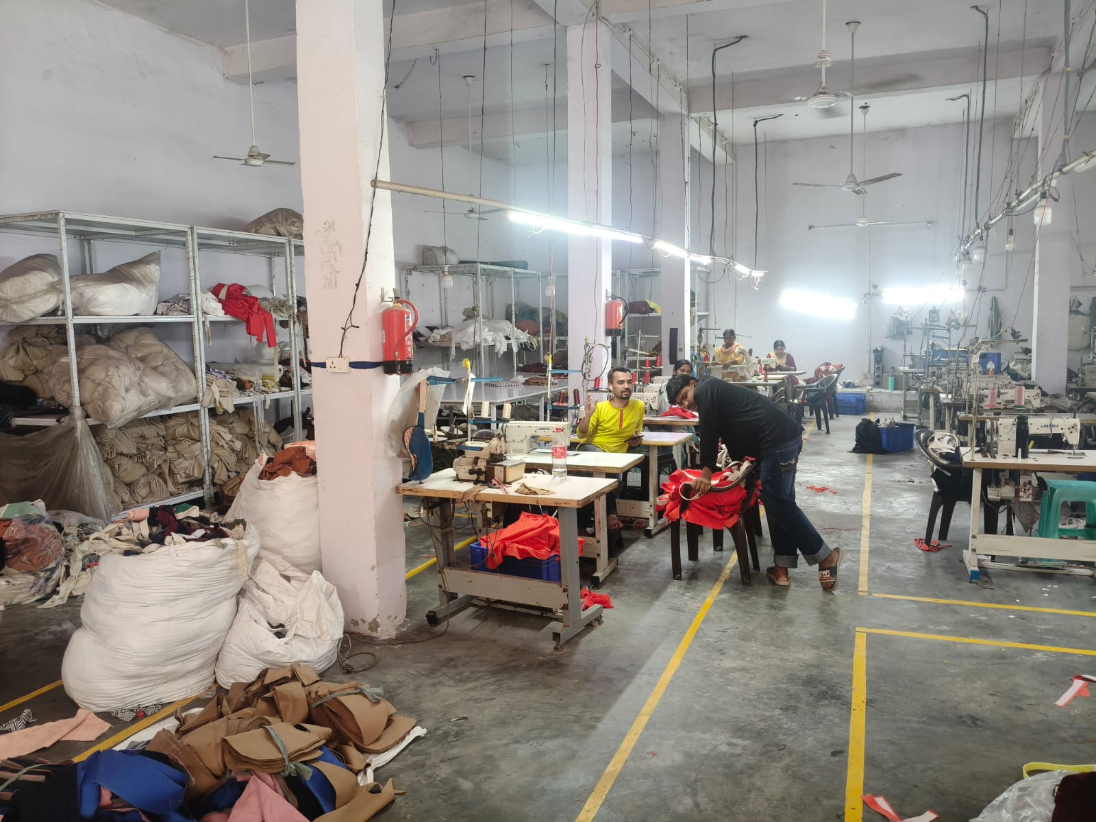 Uday Enterprises tailoring production floor in Delhi